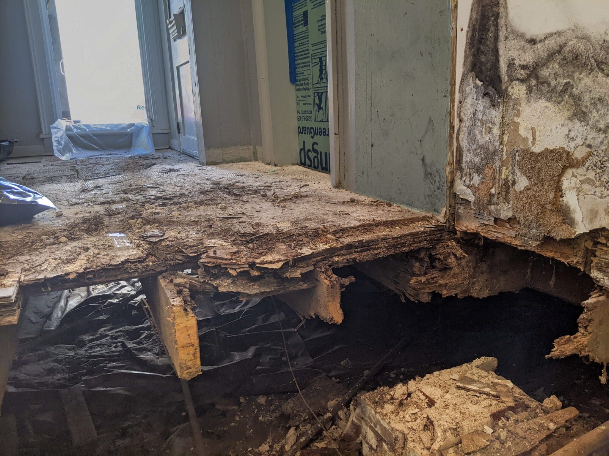 Rotten wood beams slab foundation repair